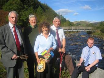 Cllr Glyn Rawlings, Bob Slater, Bette Slater (coordinator), Dr Hywel Francis MP and Scott Jones, hard at work on the river bank