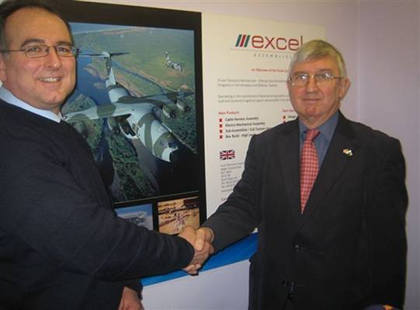 Dr Hywel Francis MP congratulating Mr John Bosworth, Managing Director of Excel Assemblies during his recent to the Company